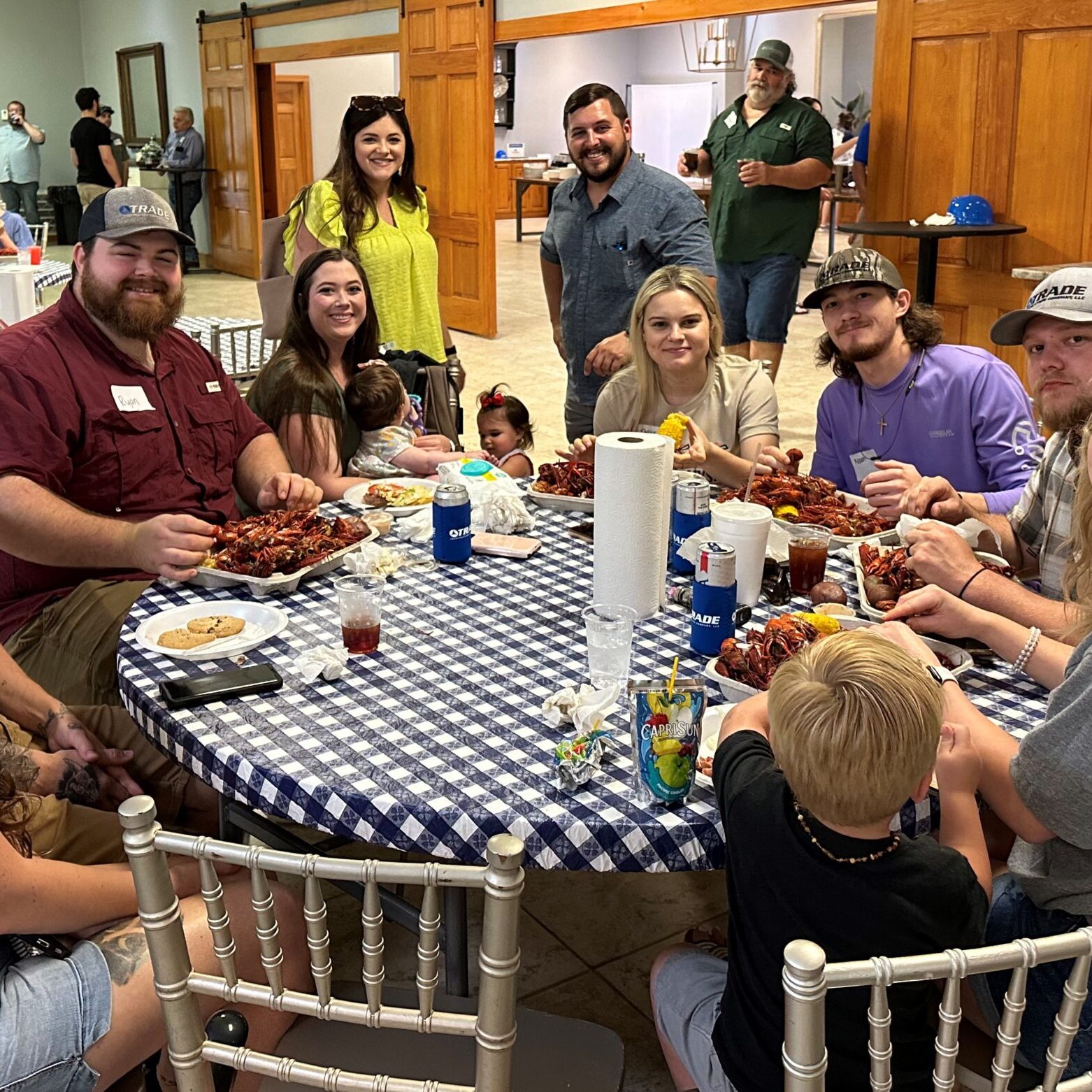 Trade employees and their families at a crawfish boil